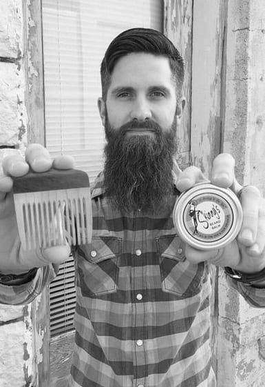 bearded man with wooden beard comb bearded man with wooden beard comb