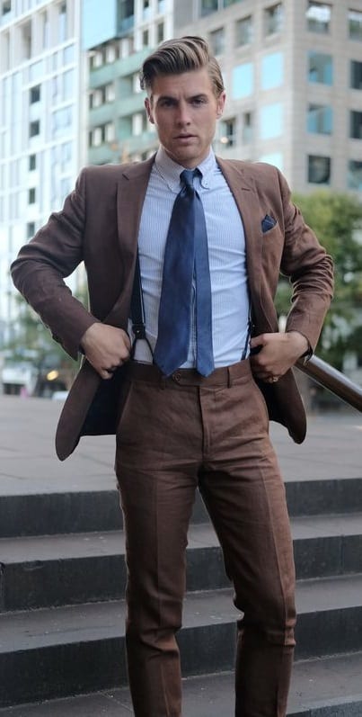 brown suit with light blue shirt and suspender brown suit with light blue shirt and suspender