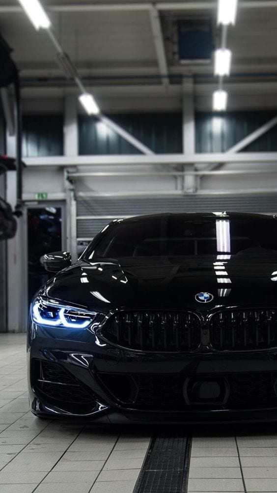 BLACK BMW PARKED BLACK BMW PARKED