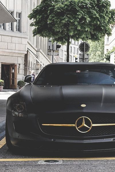 BLACK MERCEDES WITH GOLDEN LOGO BLACK MERCEDES WITH GOLDEN LOGO
