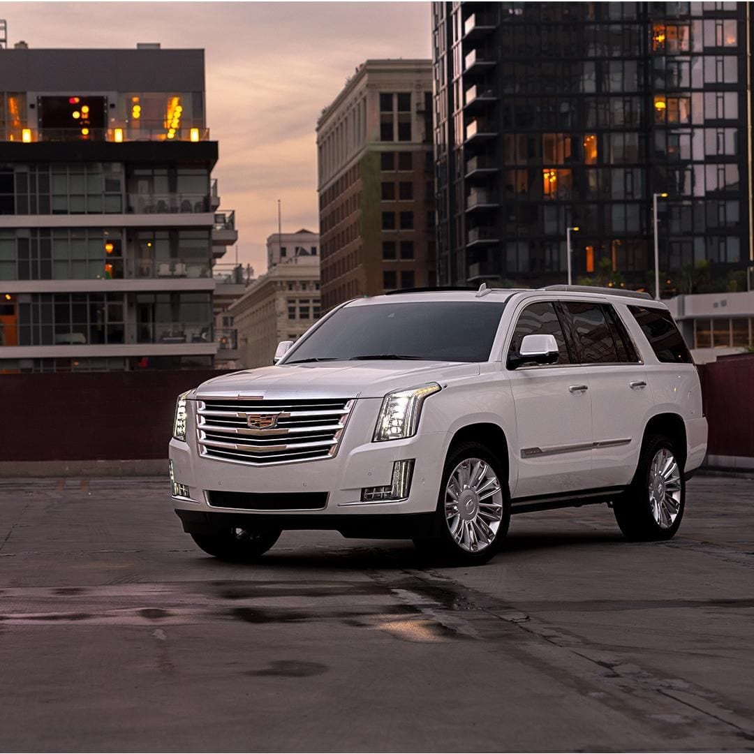 WHITE CADILLAC SUV WHITE CADILLAC SUV