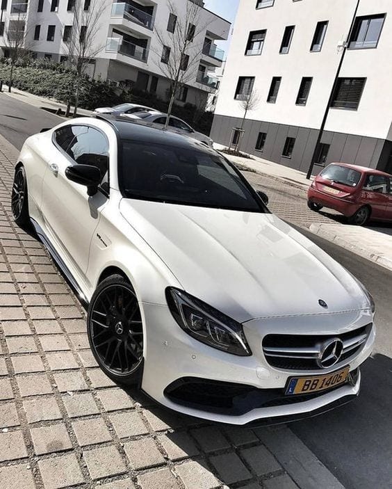 WHITE MERCEDES COUPE