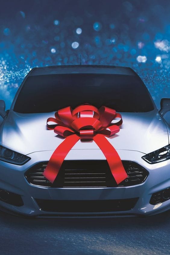 White car with bow for gift White car with bow for gift