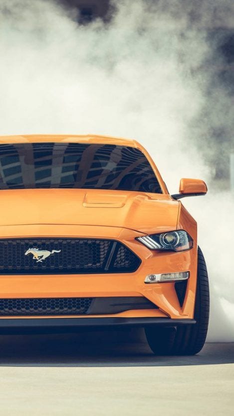 YELLOW MUSTANG IN THE SMOKE YELLOW MUSTANG IN THE SMOKE