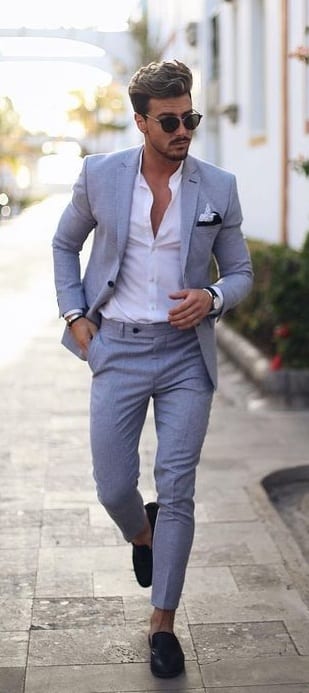 Grey suit, white shirt,sunglasses Grey suit, white shirt,sunglasses