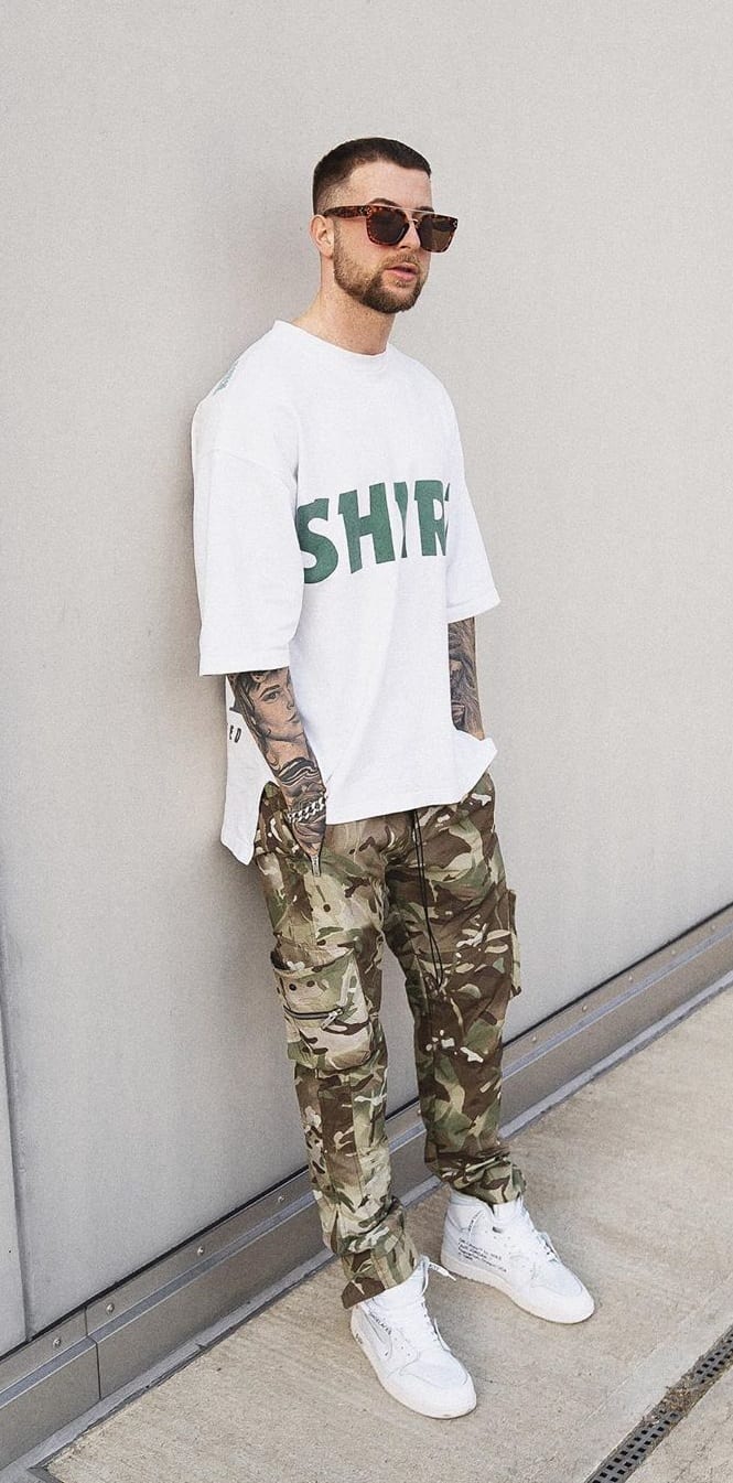 Camouflage Trousers Paired Up with a White T-Shirt Camouflage Trousers Paired Up with a White T-Shirt