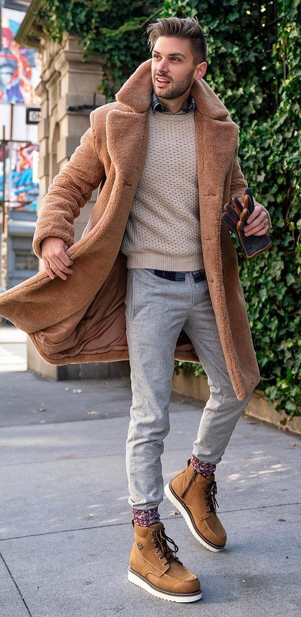Shirt layered with sweater and teddy fur coat and paired with boots Shirt layered with sweater and teddy fur coat and paired with boots