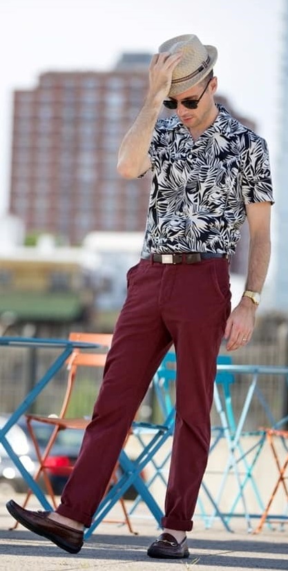 Black & White printed Shirt paired red pants & dark brown shoes styled with a leather belt & beige color hat - Printed Shirt Combinationss for Men Black & White printed Shirt paired red pants & dark brown shoes styled with a leather belt & beige color hat - Printed Shirt Combinationss for Men