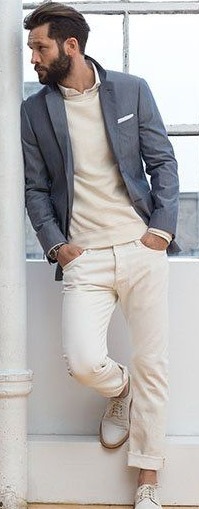 A inner shirt with cream t-shirt and grey suit. Has a white shoes and a watch_ A inner shirt with cream t-shirt and grey suit. Has a white shoes and a watch_
