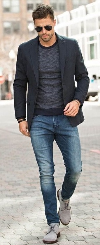 Dark grey tshirt with a darker tone of grey colored suit Wearing a blue denim. Accessorized with shades and light grey shoes_ Dark grey tshirt with a darker tone of grey colored suit Wearing a blue denim. Accessorized with shades and light grey shoes_