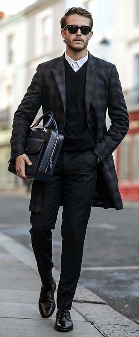 White undershirt with v-neck black t-shirt and checkered suit with shades and bag White undershirt with v-neck black t-shirt and checkered suit with shades and bag