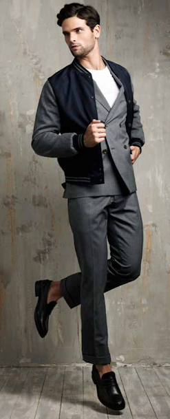 a double -breasted suit with bomber jacket and black boots a double -breasted suit with bomber jacket and black boots