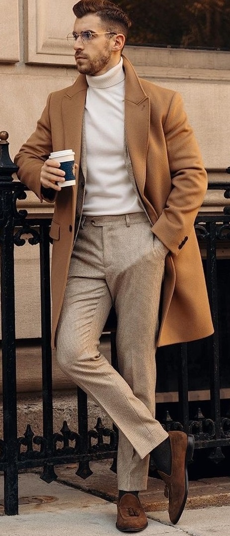 Cream turtle neck t-shirt with dark beige long overcoat and a lighter shade of beige trousers_ Cream turtle neck t-shirt with dark beige long overcoat and a lighter shade of beige trousers_