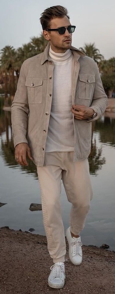beige joggers with turtle neck t-shirt and light brown jacket with shades and white sneakers_ beige joggers with turtle neck t-shirt and light brown jacket with shades and white sneakers_