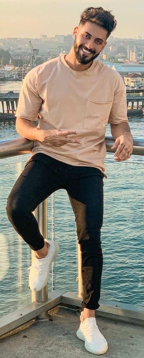 beige t-shirt with black denims and white sneakers_ beige t-shirt with black denims and white sneakers_