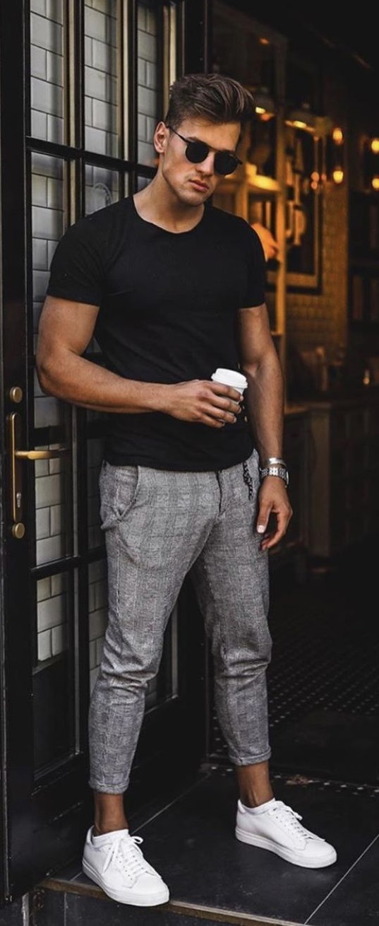 black t-shirt and grey checked chinos wearing shades, watch and white sneakers_ black t-shirt and grey checked chinos wearing shades, watch and white sneakers_