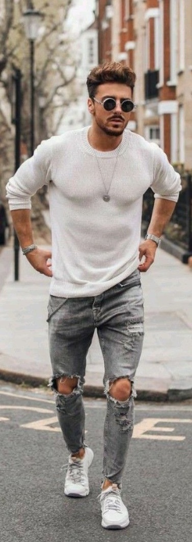 cream t-shirt with ripped grey denims, locket, shades, watch and bracelet, wearing a white sneakers_ cream t-shirt with ripped grey denims, locket, shades, watch and bracelet, wearing a white sneakers_