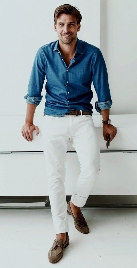 white chinos with blue shirt accessorized with belt and a watch and boots white chinos with blue shirt accessorized with belt and a watch and boots