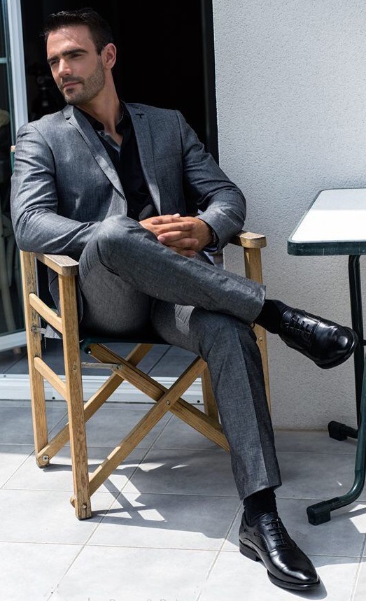 shiny grey suit with blak under shirt and boots shiny grey suit with blak under shirt and boots