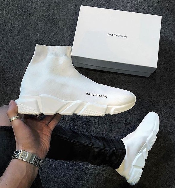 Balenciaga Speed Trainer in white color being one of the must have products to own Balenciaga Speed Trainer in white color being one of the must have products to own