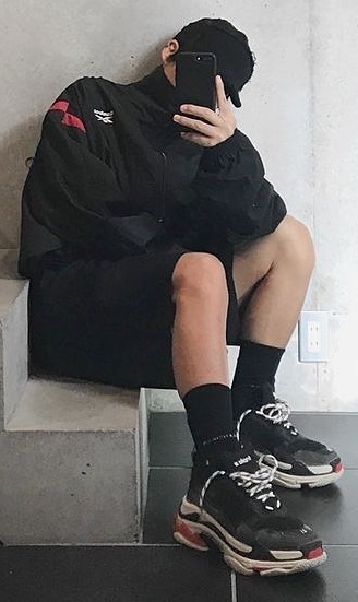 Balenciaga Triple S Sneakers with socks, with a jacket and shorts, accessorized with a cap and shorts, being one of the must-have products to own Balenciaga Triple S Sneakers with socks, with a jacket and shorts, accessorized with a cap and shorts, being one of the must-have products to own