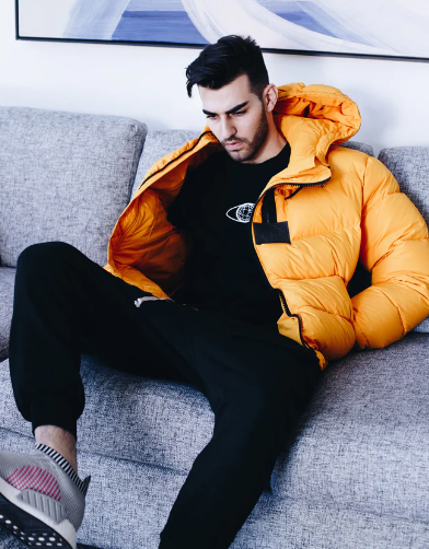 Hooded Puffer Jacket in orange Hooded Puffer Jacket in orange