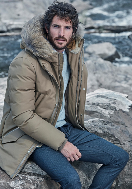 Parka-Style Puffer Jacket in brown color, sitting on a rock Parka-Style Puffer Jacket in brown color, sitting on a rock