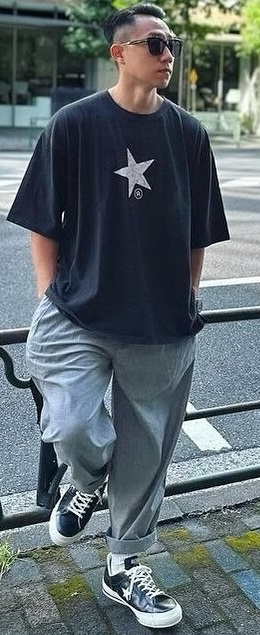 an oversized tshirt with grey bottoms and a sneaker brand - Converse an oversized tshirt with grey bottoms and a sneaker brand - Converse