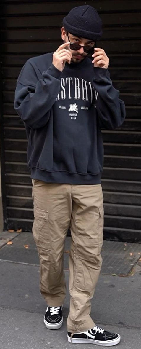 beige joggers with blackish grey thsirt accessorized with shades and shoes beige joggers with blackish grey thsirt accessorized with shades and shoes
