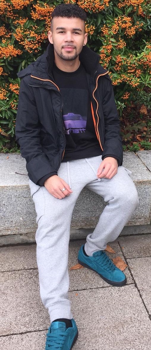 cargo pants in grey color with black tshirt and hooddie with a socks and socks cargo pants in grey color with black tshirt and hooddie with a socks and socks