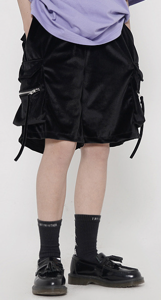 cargo shorts in black color with a lavender colored tshirt and a black shoes and socks cargo shorts in black color with a lavender colored tshirt and a black shoes and socks