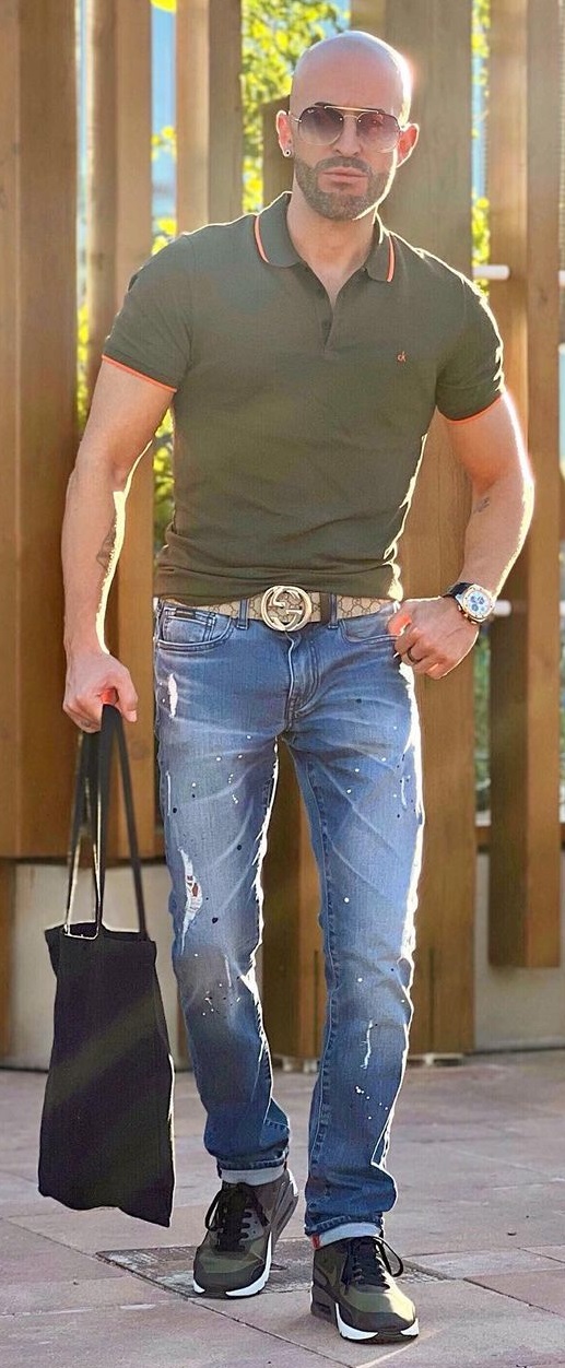 Gucci belt being a must-have product to buy with denims and a green tshirt, accessorized with shades, watch and a tote bag Gucci belt being a must-have product to buy with denims and a green tshirt, accessorized with shades, watch and a tote bag