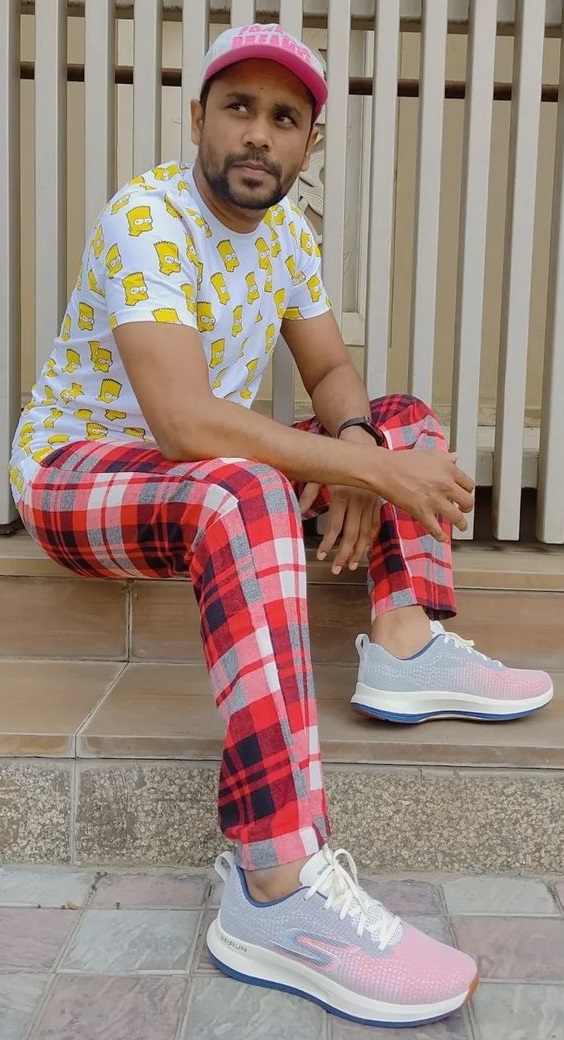 plaid bottom with a tshirt and a sneaker brand - Skechers plaid bottom with a tshirt and a sneaker brand - Skechers