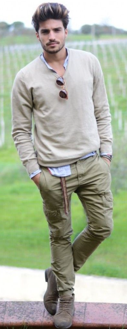 slim-fit cargo pant in green color with a greenish tshirt and an undershirt, accessorized with shades slim-fit cargo pant in green color with a greenish tshirt and an undershirt, accessorized with shades