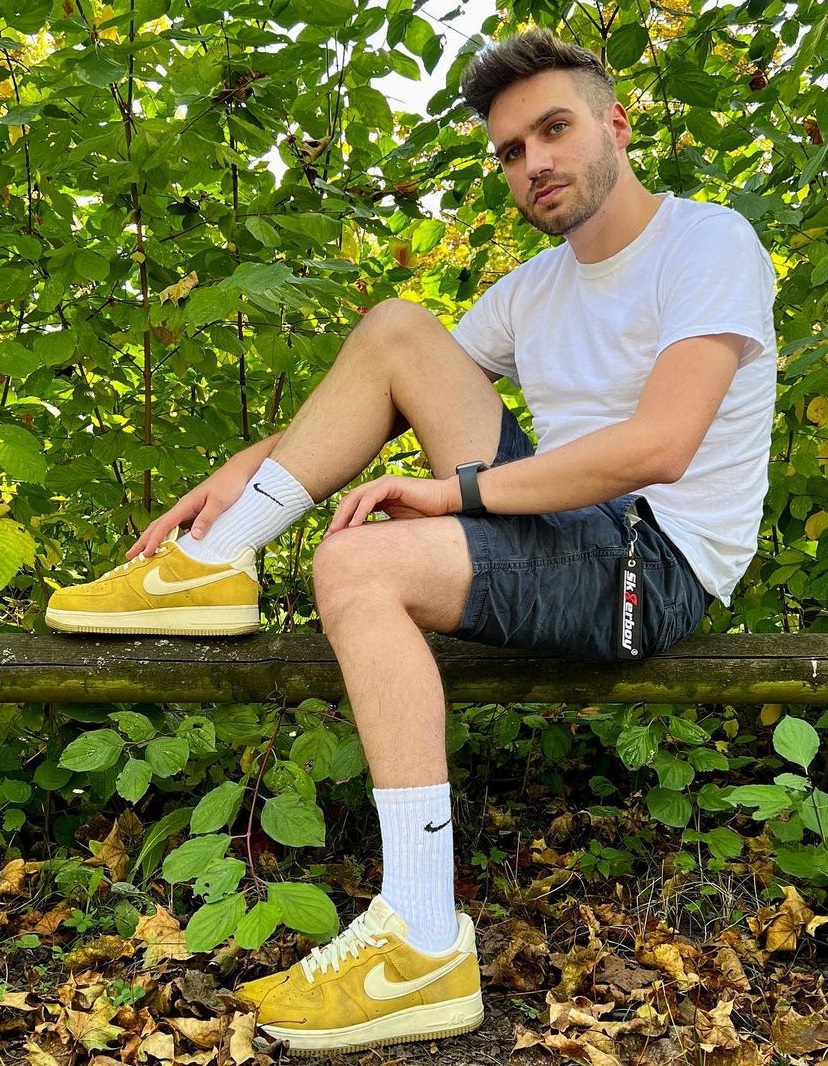 white tshirt with a shorts, sneaker brand nike and a watch white tshirt with a shorts, sneaker brand nike and a watch