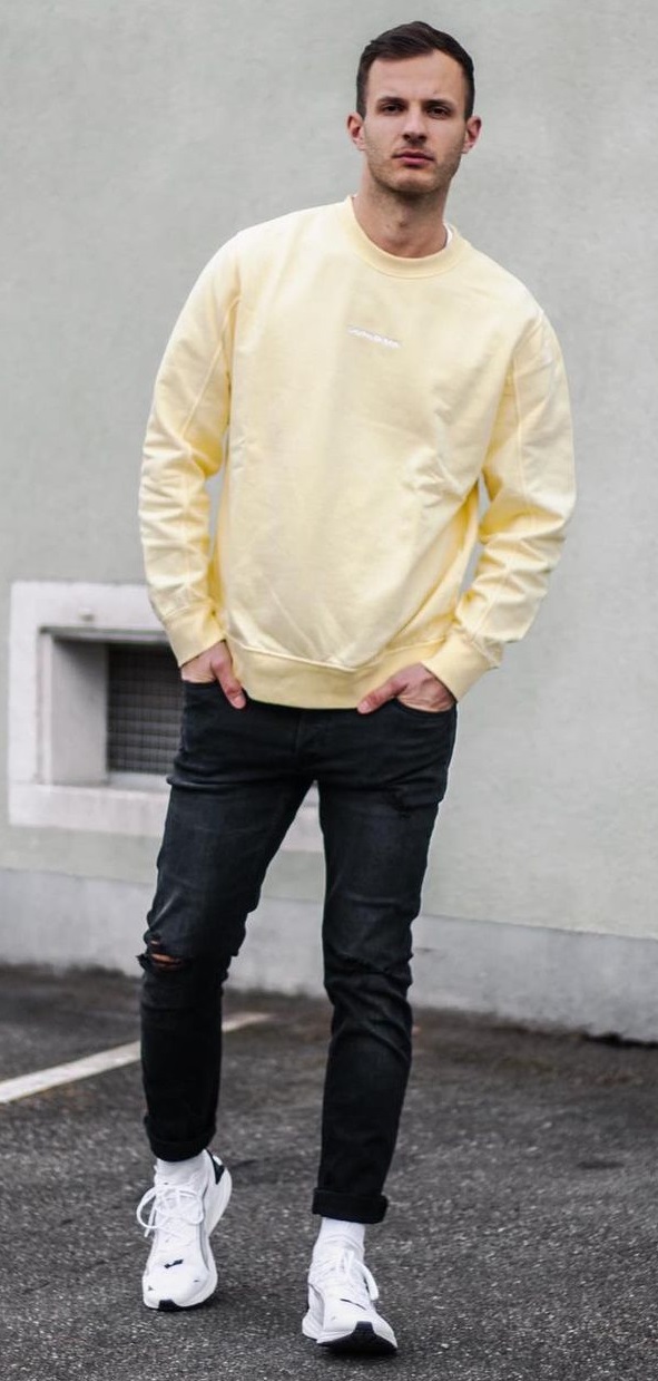 yellow sweatshirt with black denim and a sneaker brand - Puma yellow sweatshirt with black denim and a sneaker brand - Puma