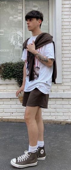 Minimalism with white tee and brown shorts Minimalism with white tee and brown shorts